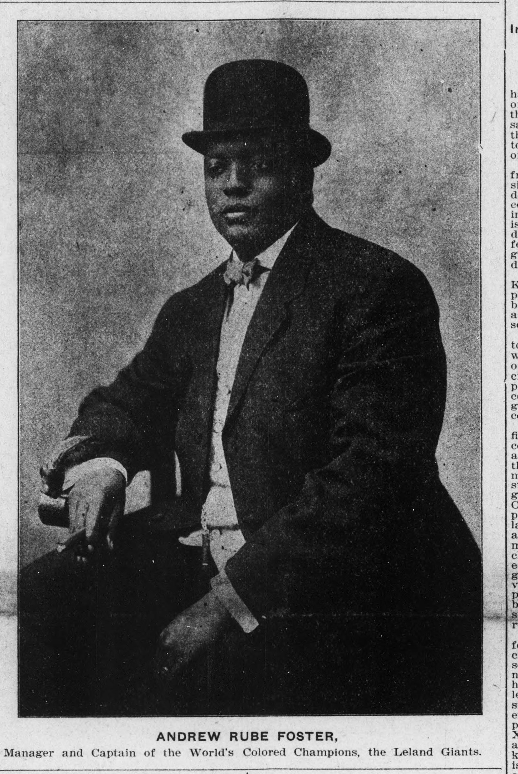 Large studio portrait of Andrew Rube Foster seated in a bowler hat, dark suit and bow tie, one hand resting on a chair arm. The caption reads Andrew Rube Foster, Manager and Captain of the World's Colored Champions, the Leland Giants.